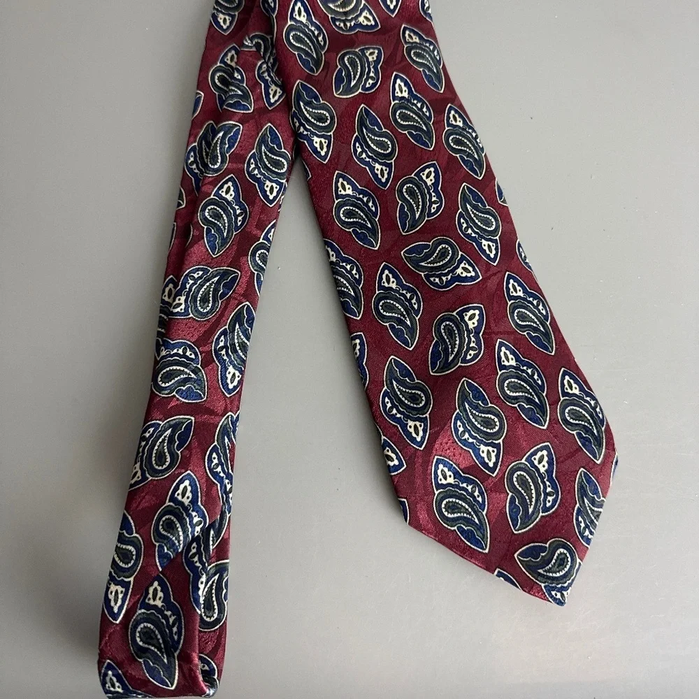 Manhattan Neck Tie necktie featuring a blue and white paisley pattern